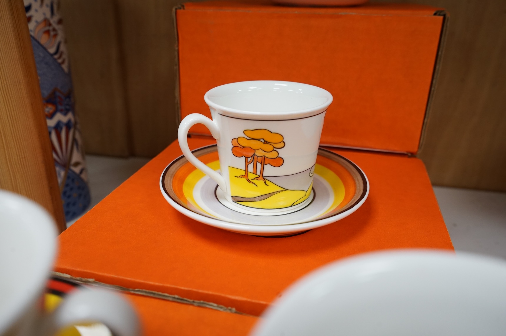 Four boxed limited edition Clarice Cliff cups and saucers to include Blue Lucerne and Windbells, saucers 11cm in diameter